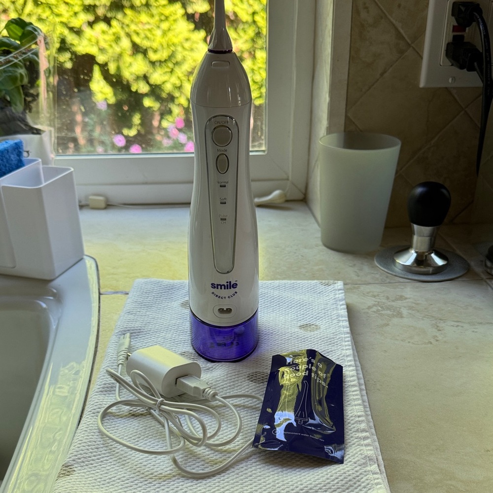 Smile White and Blue Flosser